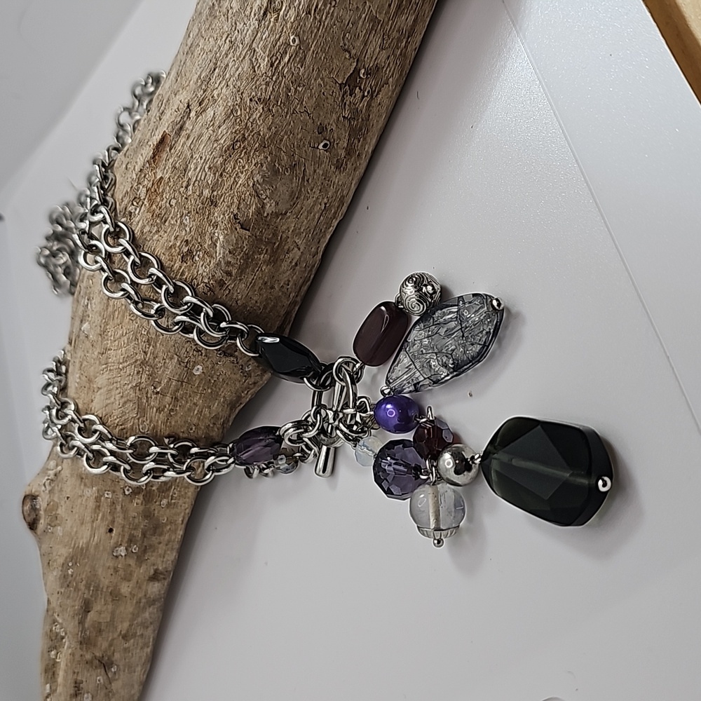 Silver necklace with bead cluster